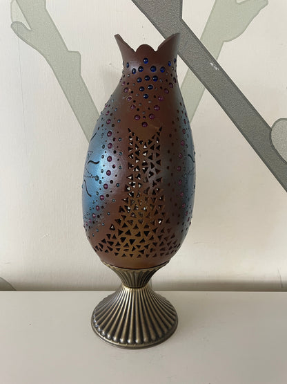 Lámpara artesanal de calabaza con temática solar