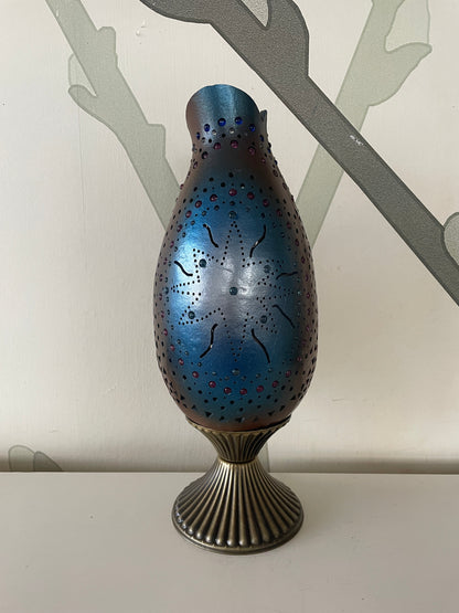 Lámpara artesanal de calabaza con temática solar